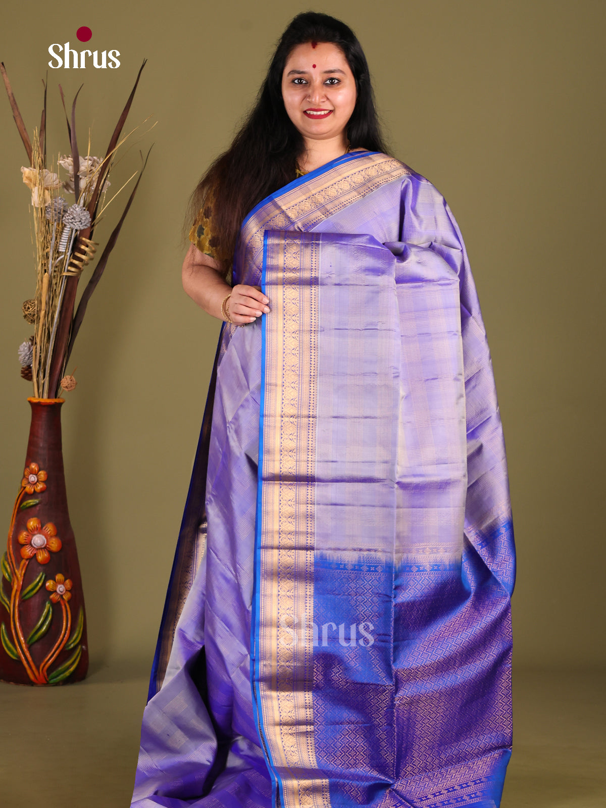 Lovely Lavender Soft Silk Saree with zari checks & Blue Zari Woven floral vines border