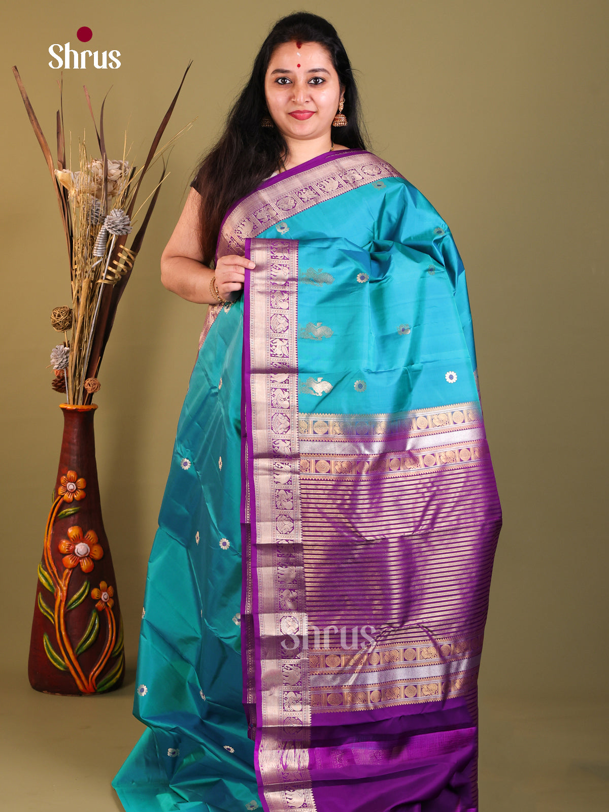 Blue and purple Kanchipuram Butta design Saree
