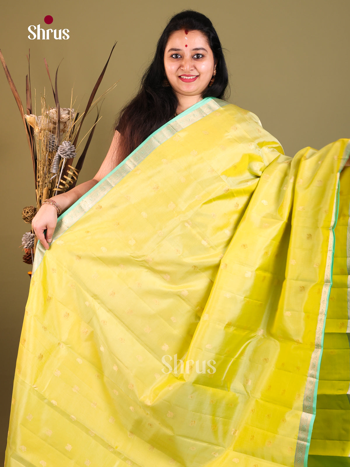 yellow and green Kanchipuram Butta design Saree -1