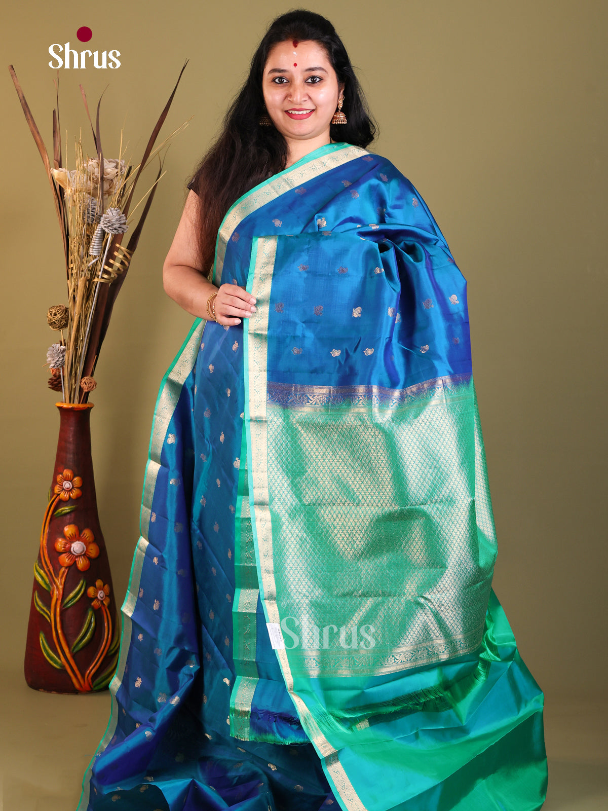 blue and teal green Kanchipuram Butta design Saree