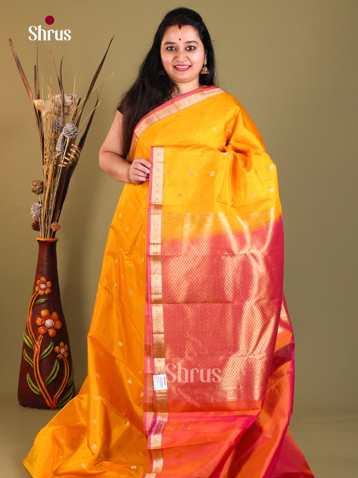 yellow and red Kanchipuram Butta design Saree