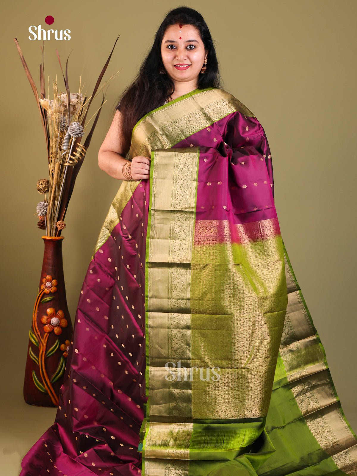 maroon and green Kanchipuram Butta design Saree