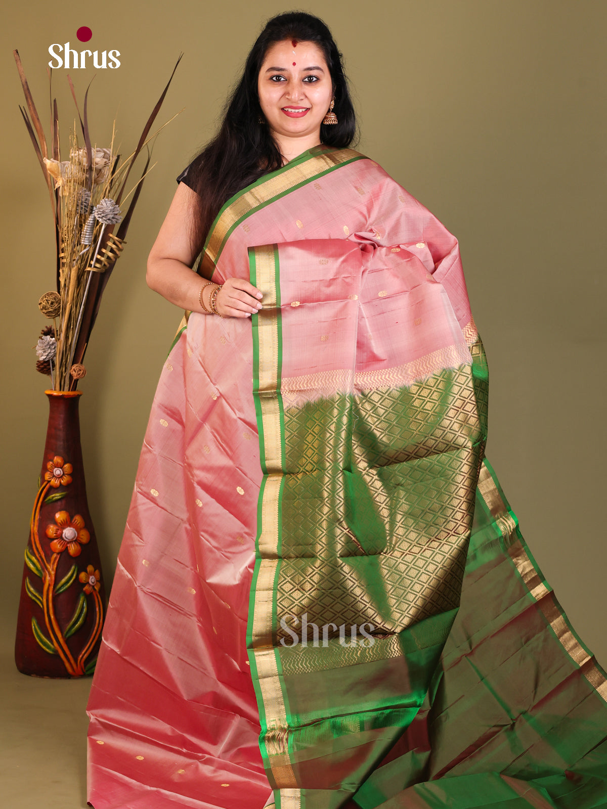 Baby pink and green Kanchipuram Butta design Saree