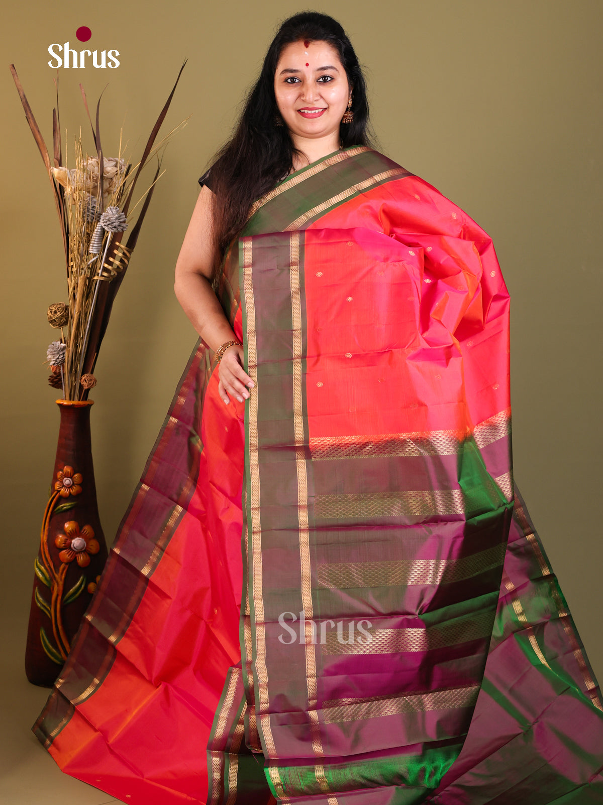 radiant red and green Kanchipuram Butta design Saree