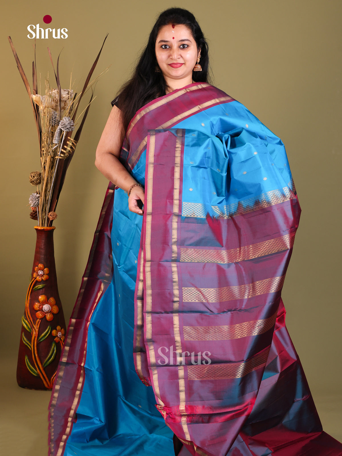 Blue and purple Kanchipuram Butta design Saree