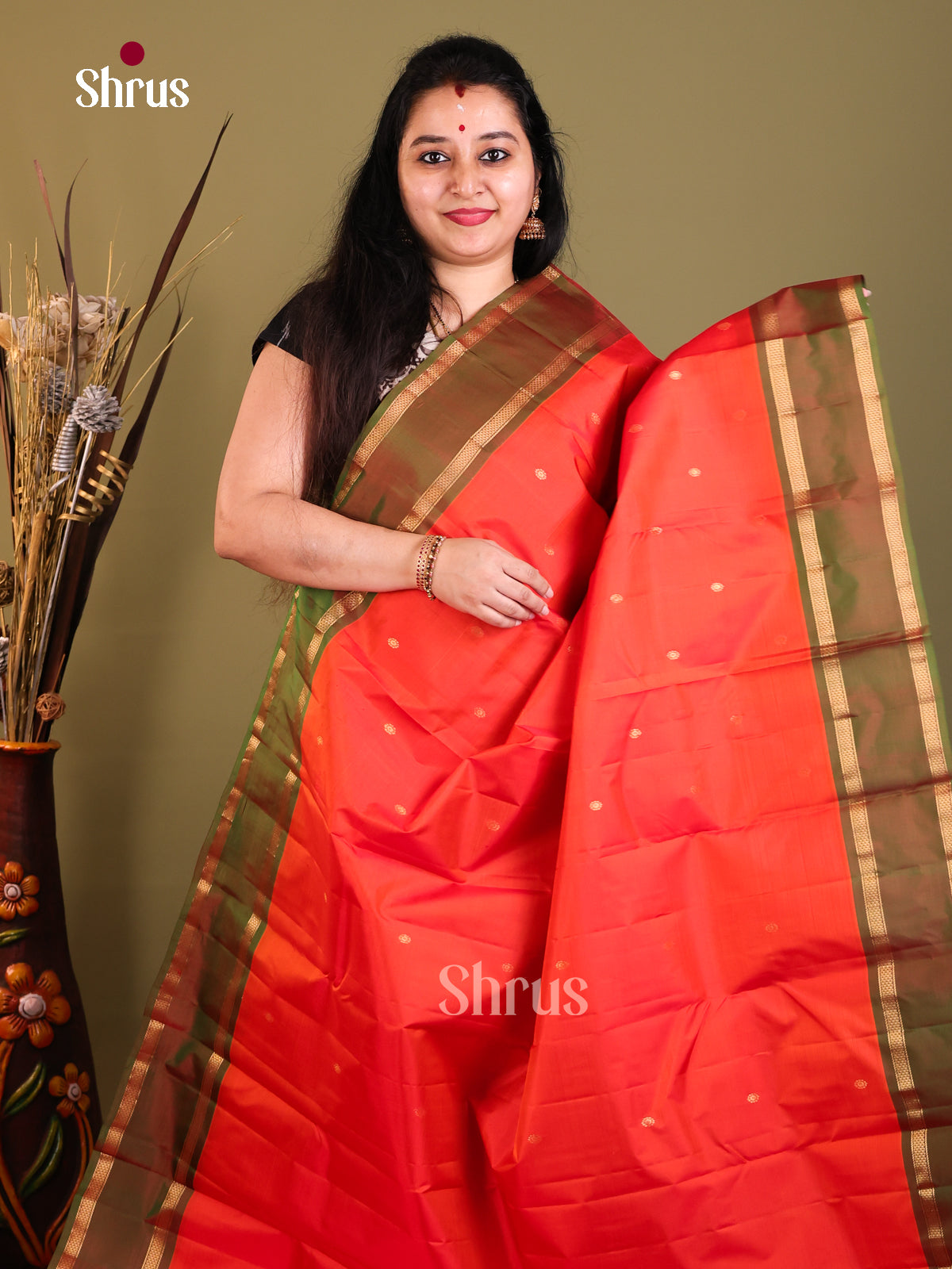 Orange and green Kanchipuram Butta design Saree -1