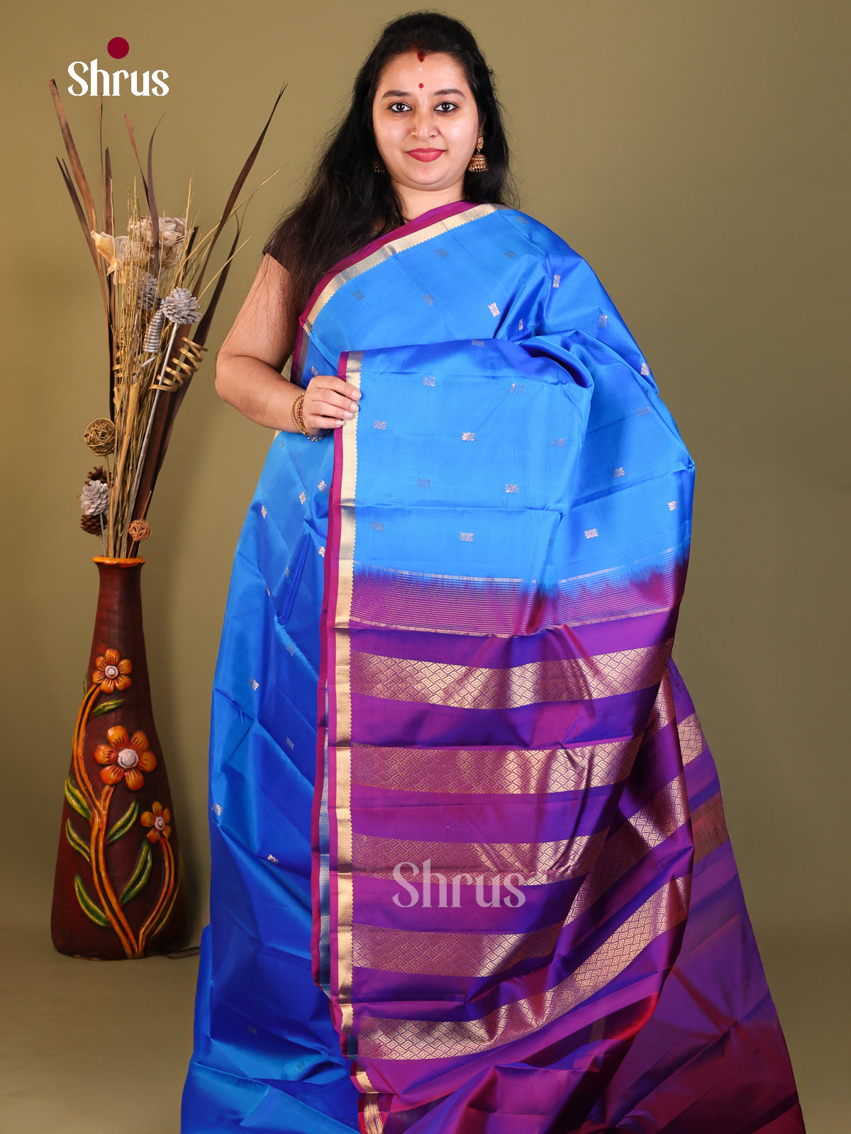Blue and purple Kanchipuram Butta design Saree