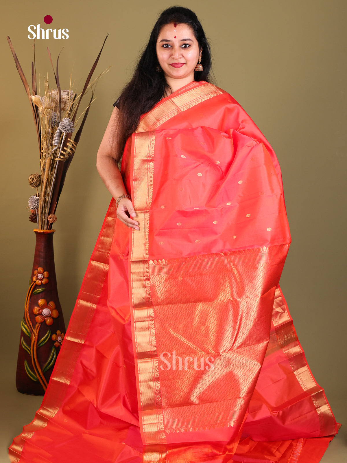 orange Kanchipuram Butta design Saree