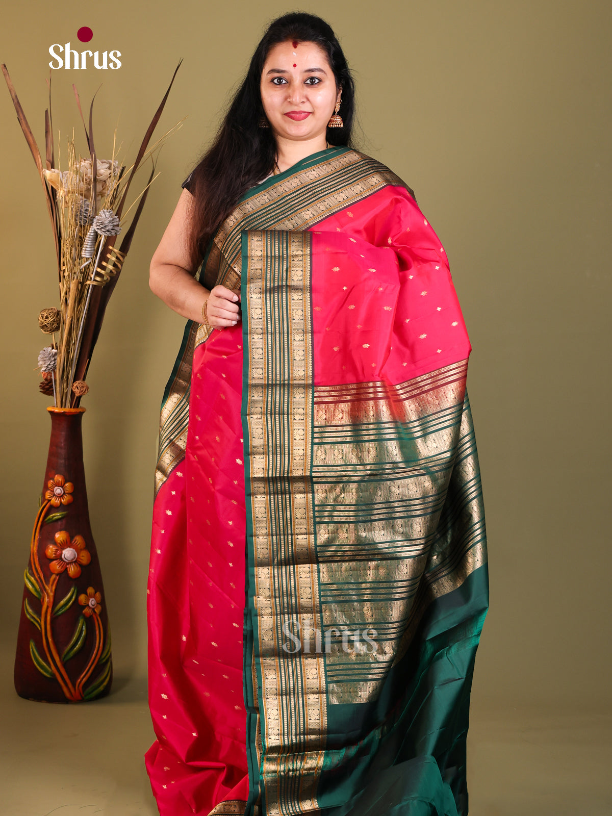Red and green Kanchipuram Korvai Butta Saree
