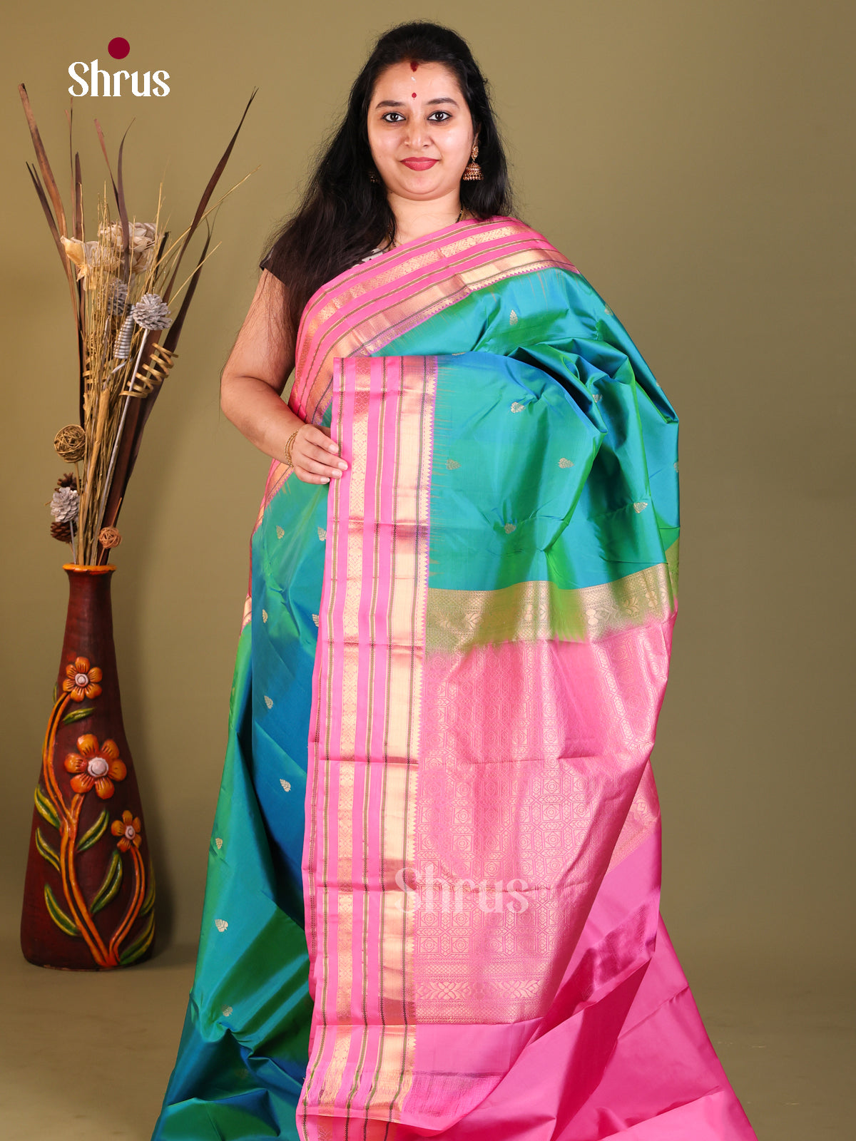 Blue and pink Kanchipuram Butta design Saree