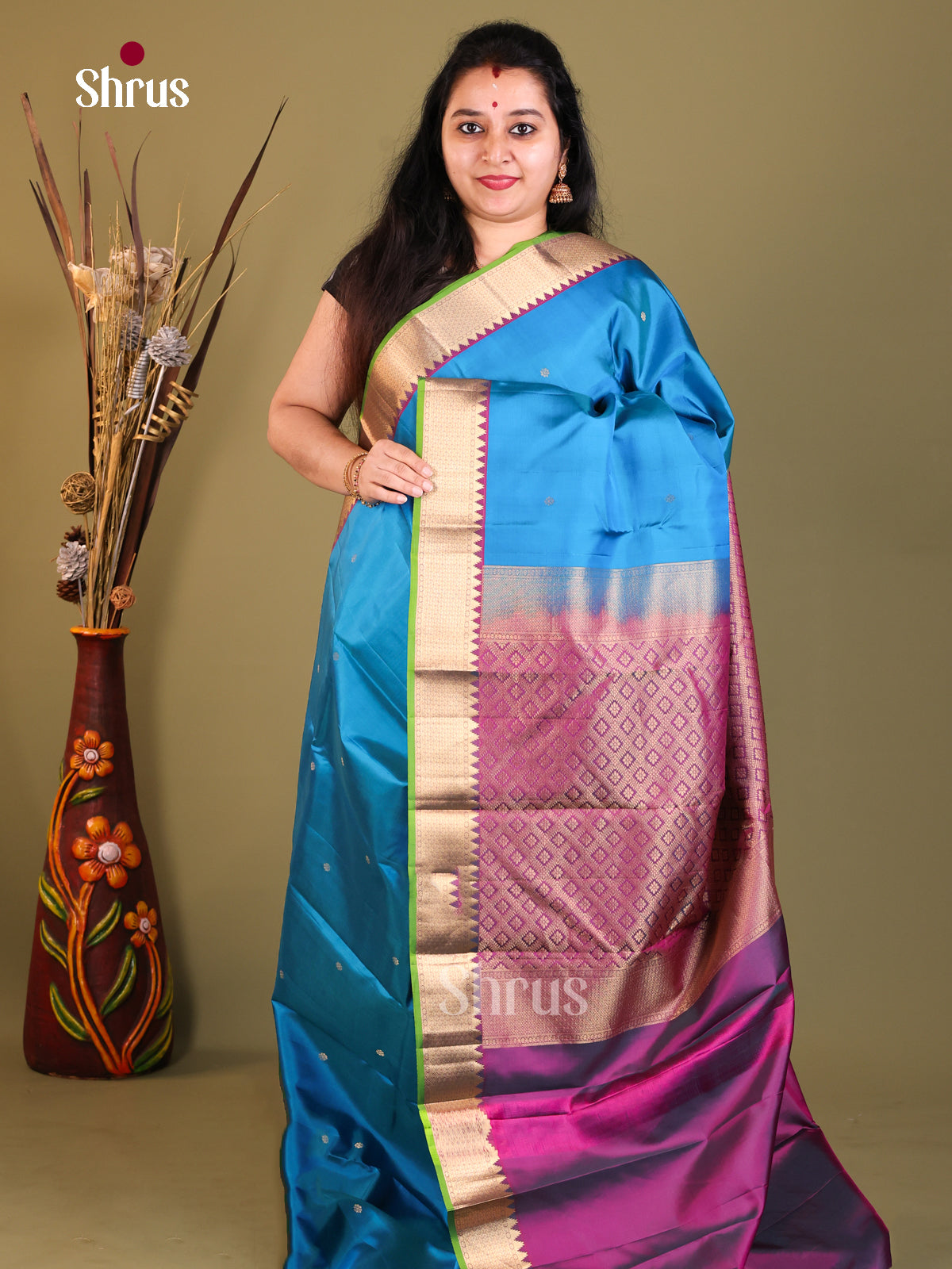 Blue and Purple Kanchipuram Butta temple design Saree