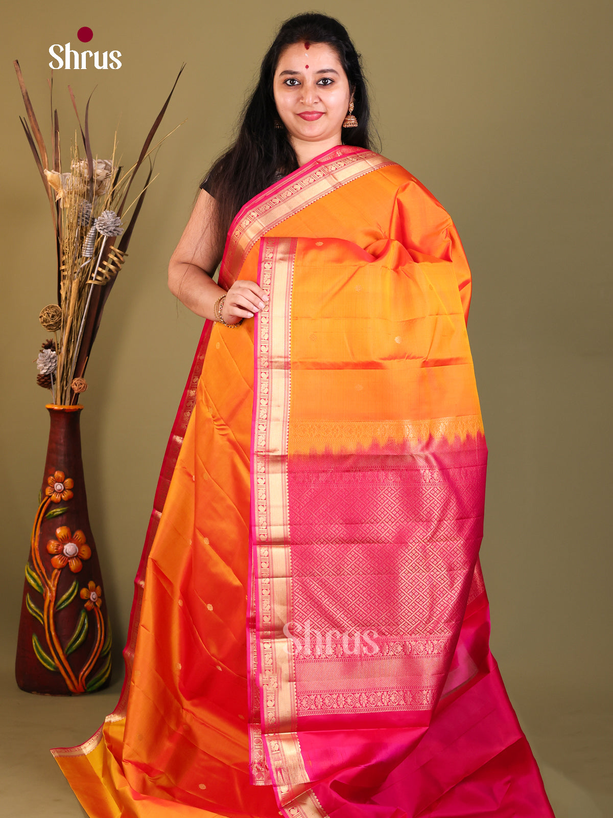 orange and pink Kanchipuram Butta design Saree