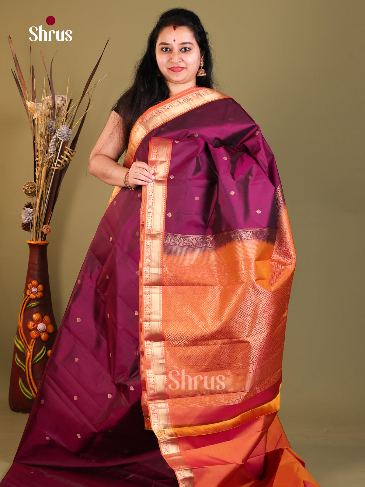 Maroon and orange Kanchipuram Butta design Saree
