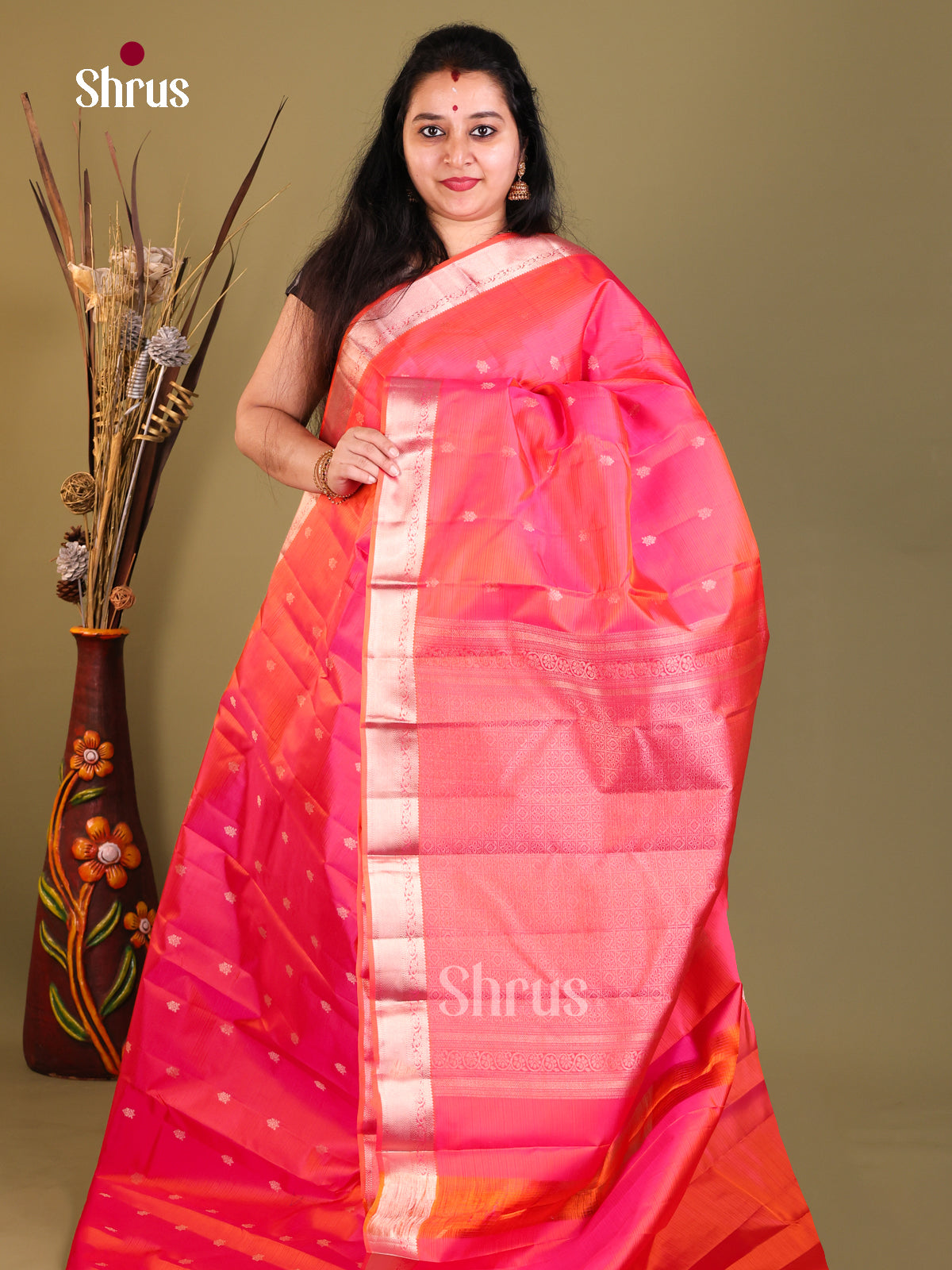 shiny radiant Kanchipuram Butta design Saree