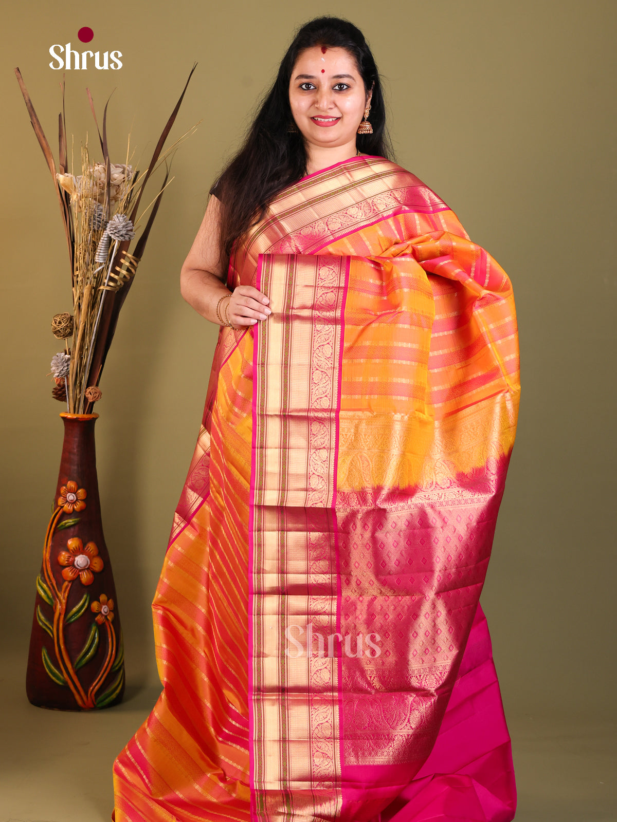 Radiant orange and pink Kanchipuram Butta design Saree