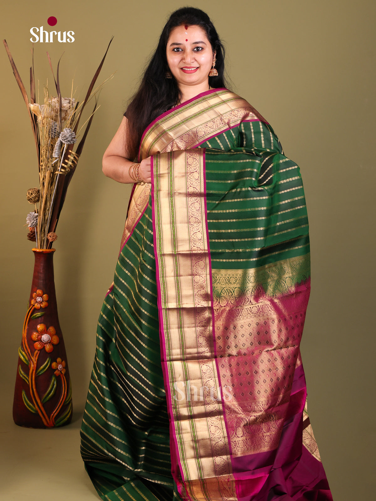 Green and maroon with big border Kanchipuram Butta design Saree