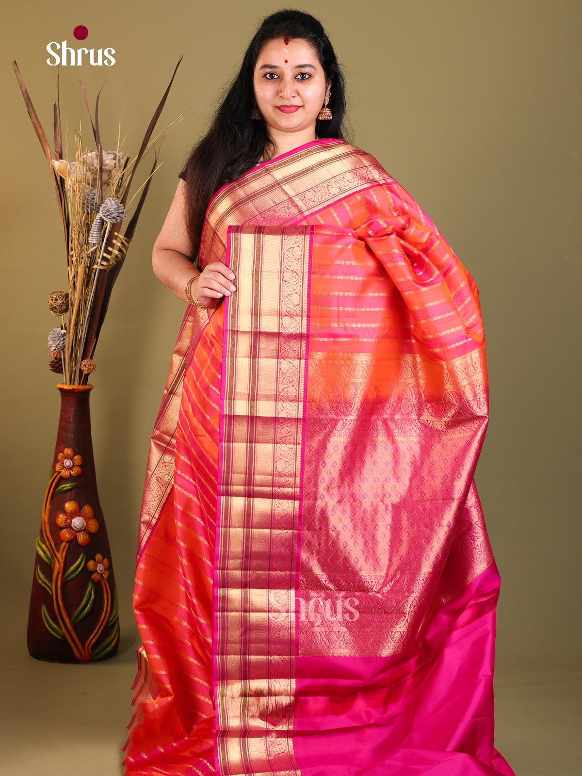 Radient and pink big zari Kanchipuram Butta design Saree