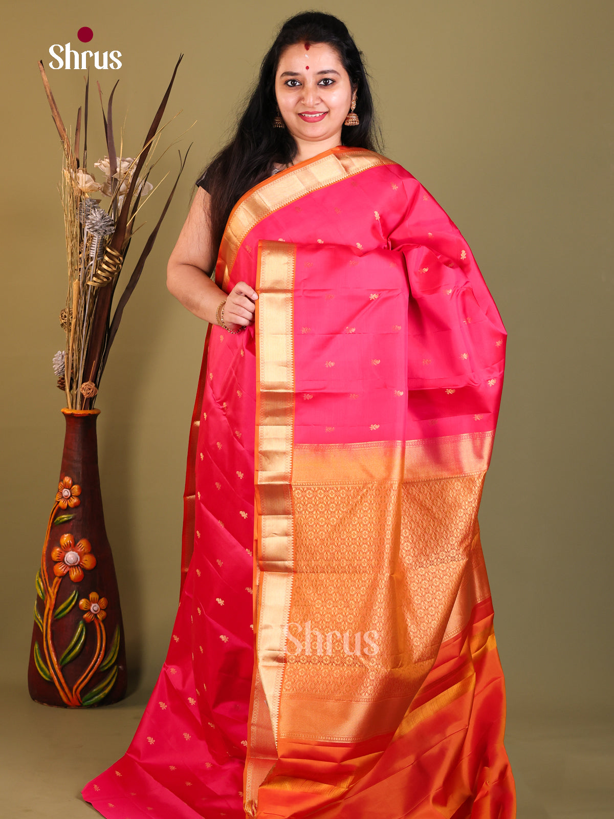 red and orange Kanchipuram Butta design Saree