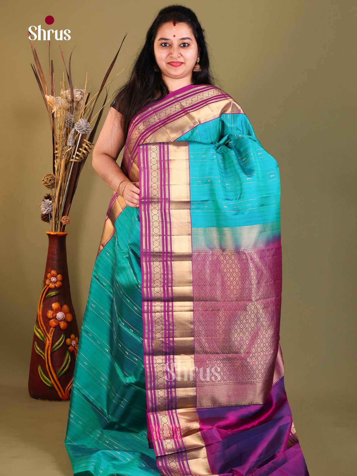 Blue Kanchipuram Butta design Saree