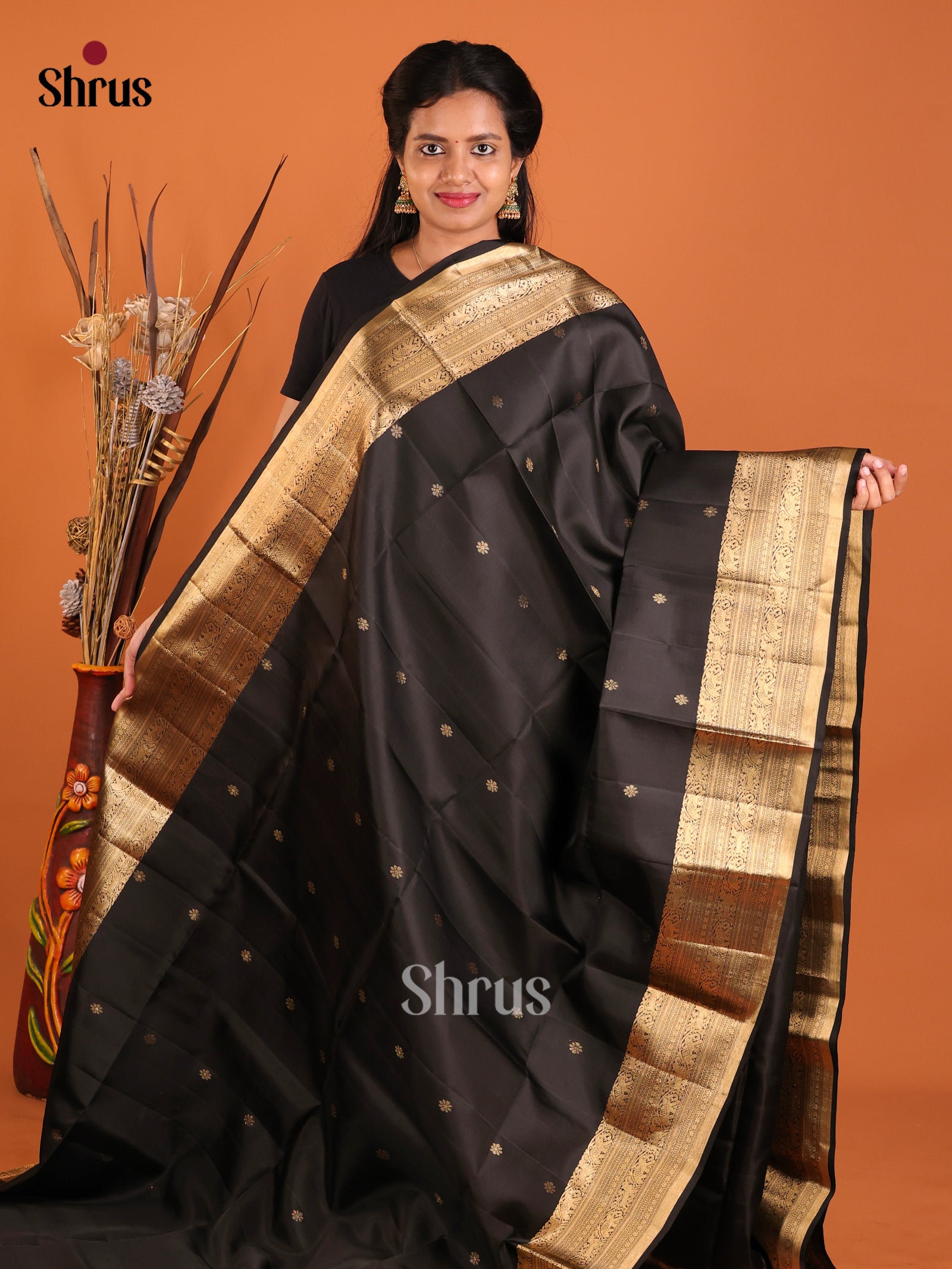Classic Black Soft Silk Saree With Golden Buttas & Zari Woven Self Border 1