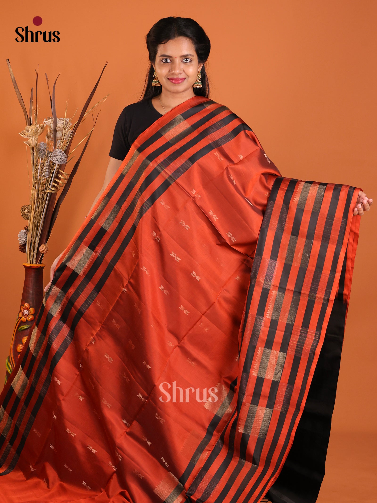 Vibrant Rust Orange Soft Silk Saree With Zari Motifs & Black Stripes Border 1