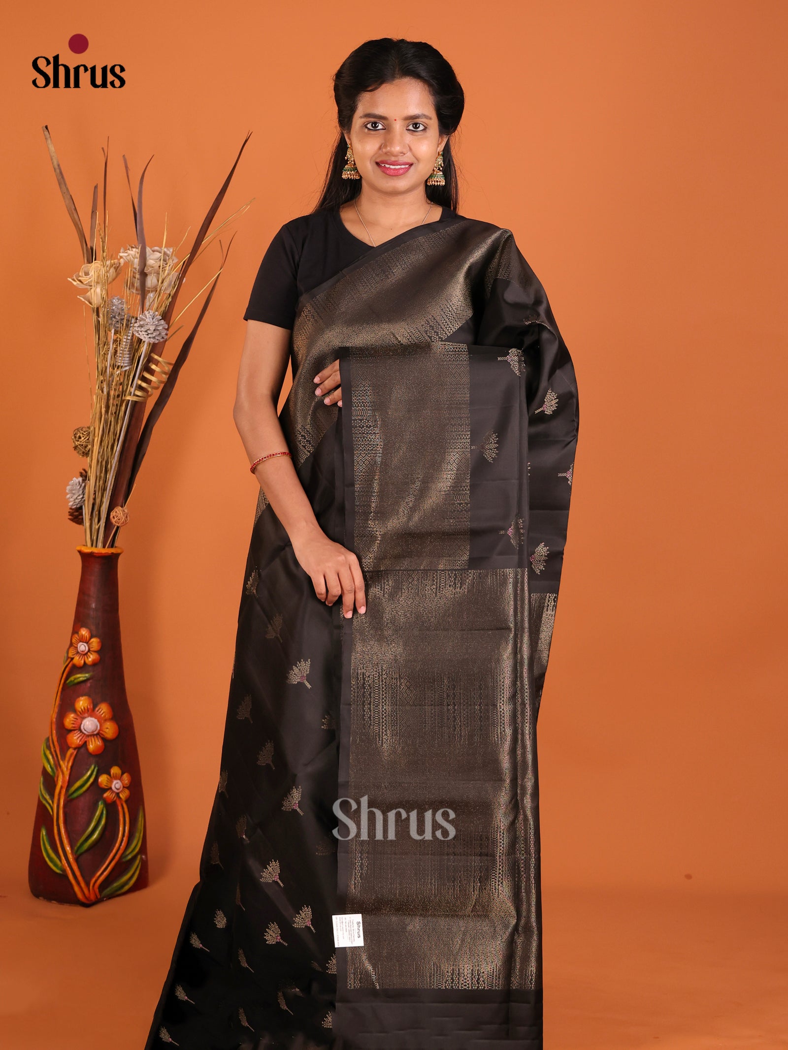 Timeless Black Soft Silk Saree With Floral Motifs & Zari Brocade Border
