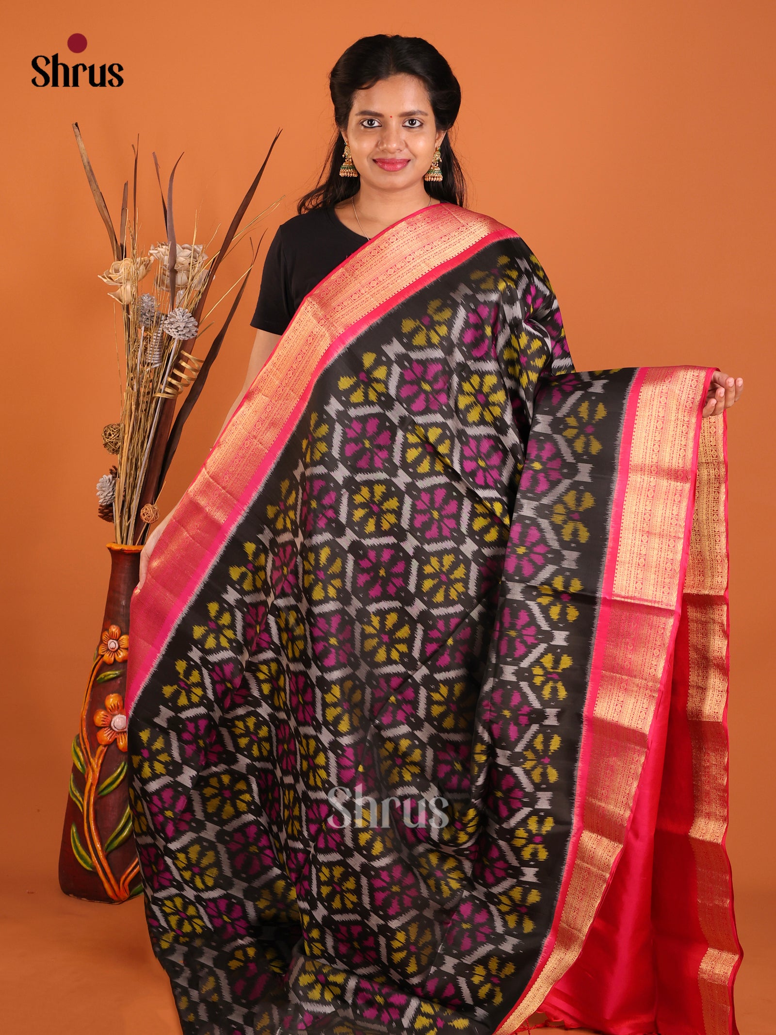Captivating Black Soft Silk Saree With Ikat Pattern & Deep Pink Brocade Pallu 1