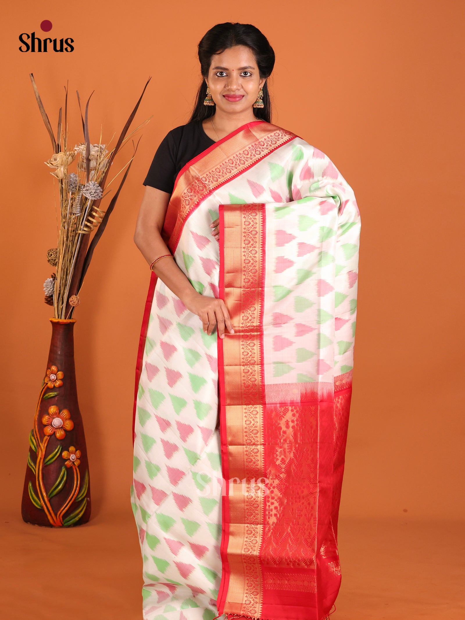 Contemporary White Soft Silk Saree With Ikkat Patterns & Red Zari Brocade Pallu
