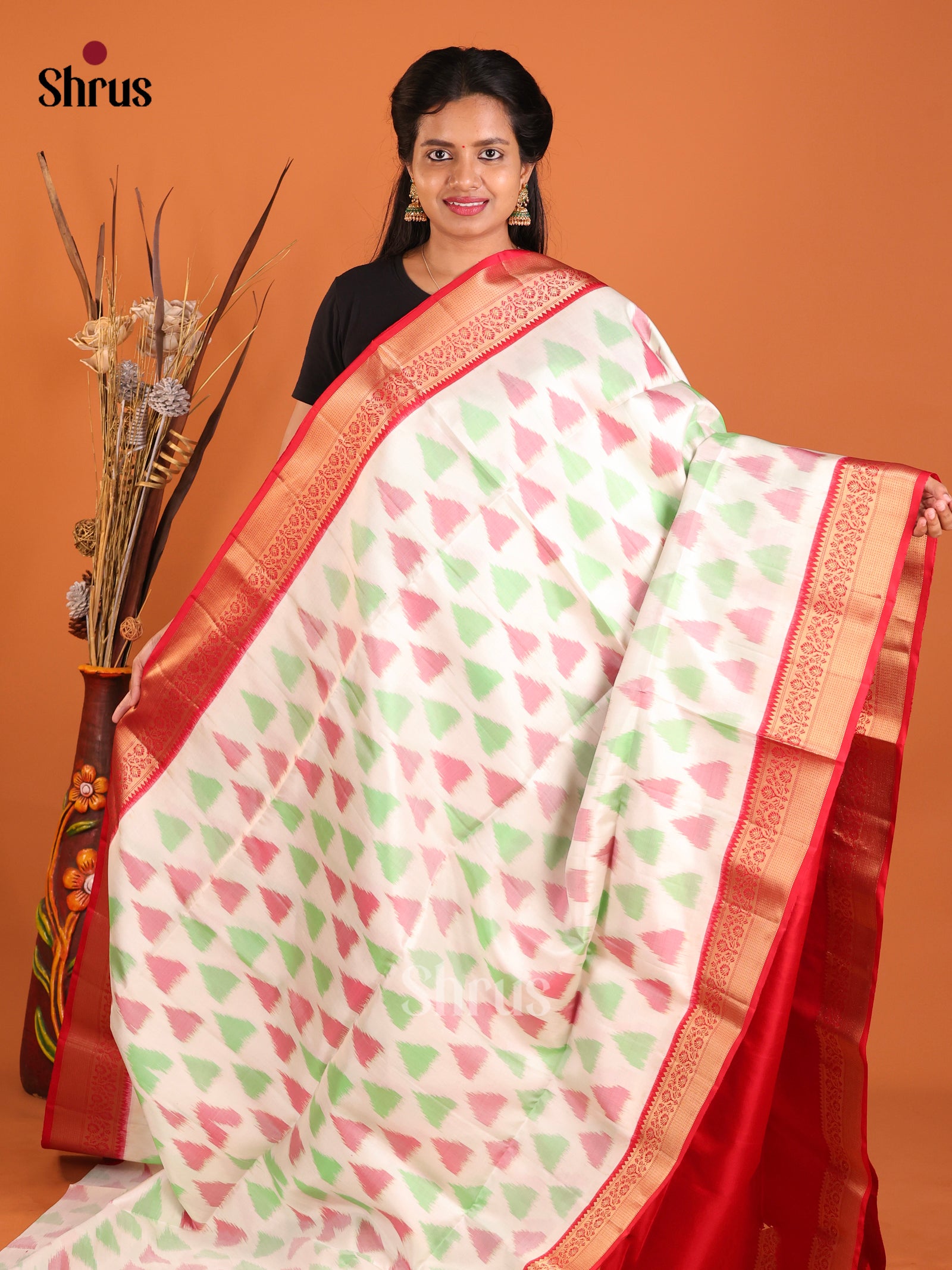Contemporary White Soft Silk Saree With Ikkat Patterns & Red Zari Brocade Pallu