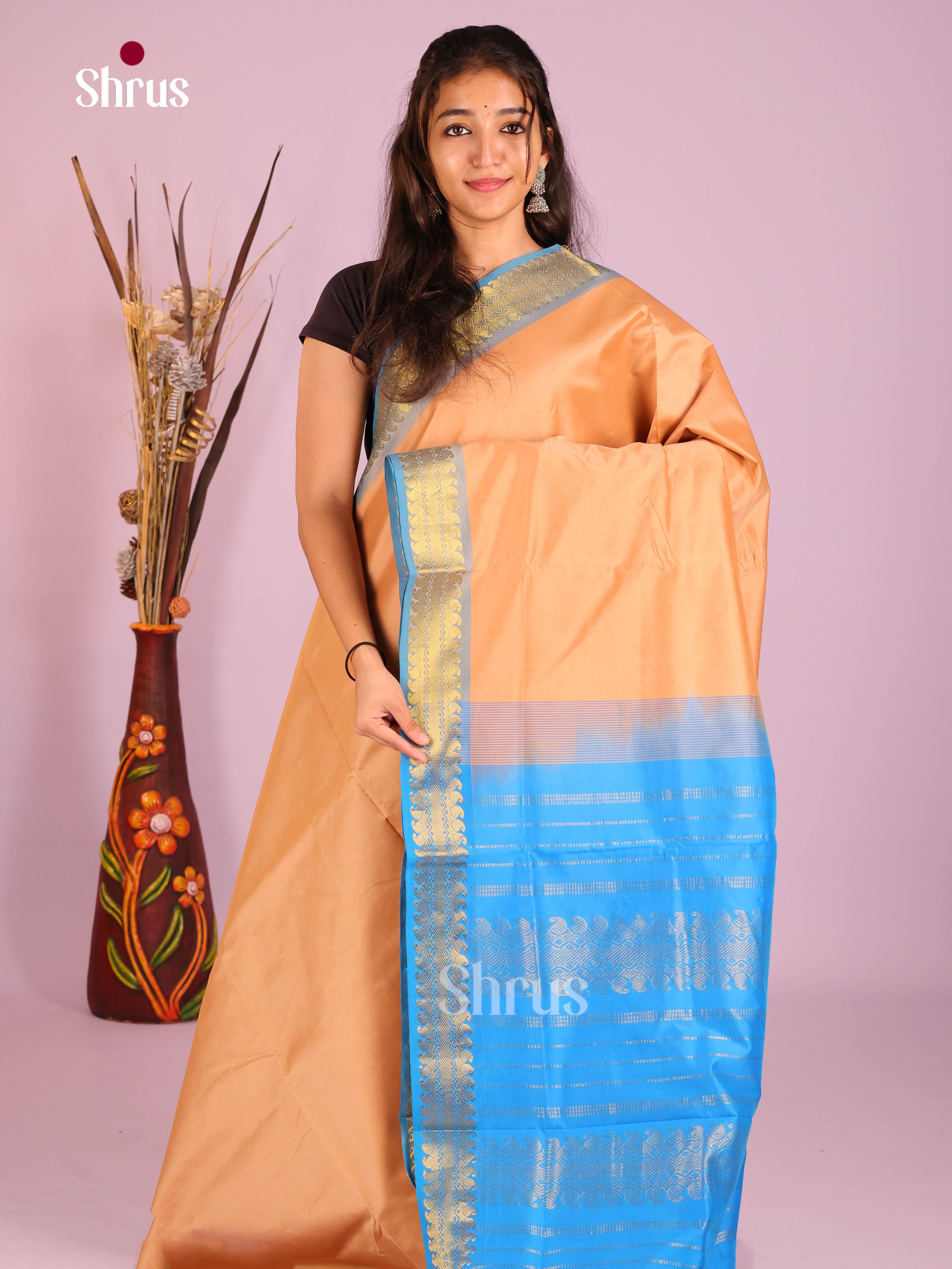 Peach & Blue - Silkcotton-halfpure Saree - Shop on Shrus.com
