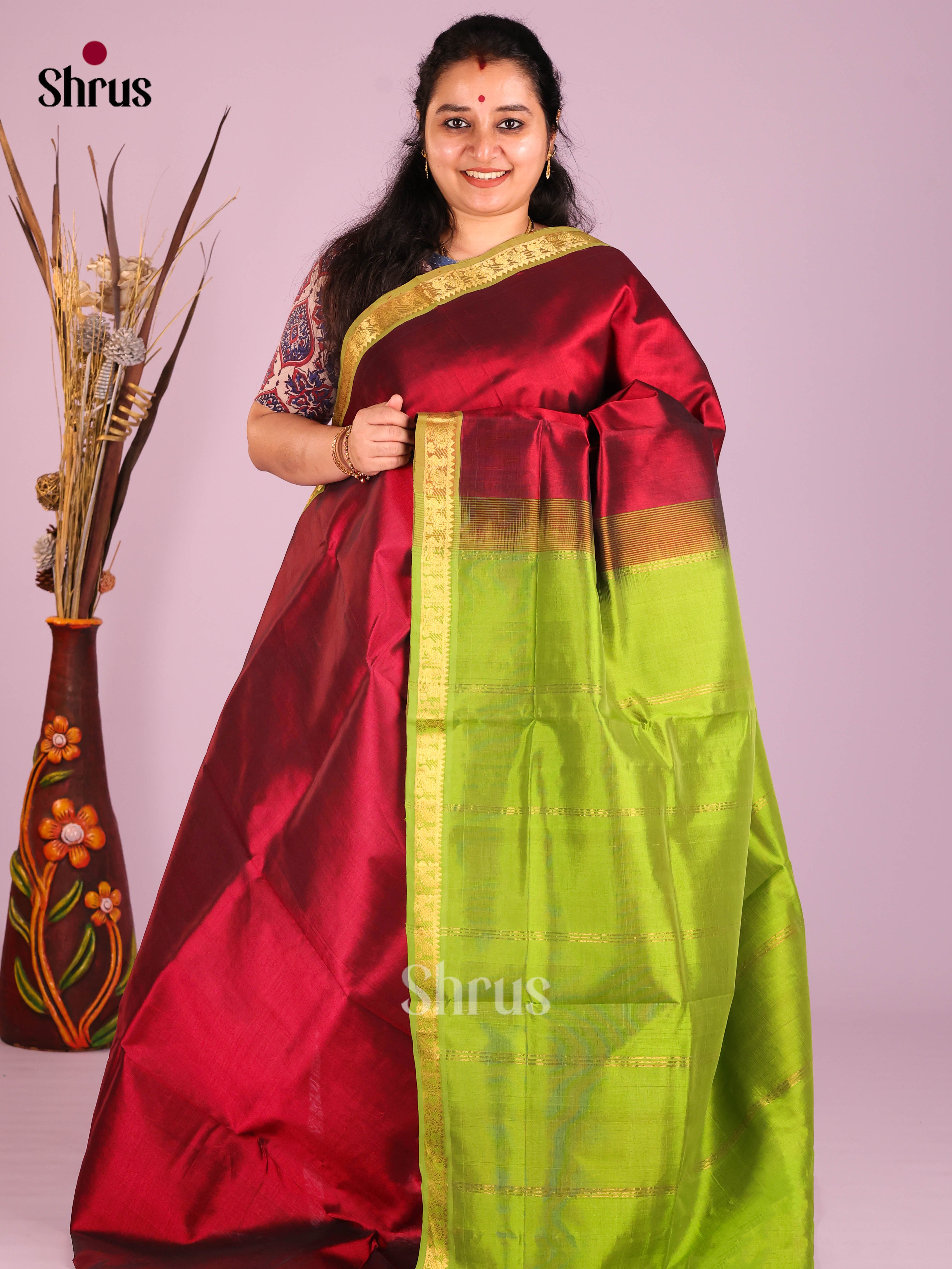 Stunning Maroon Silk Cotton Saree with Plain Body & Green Zari Border