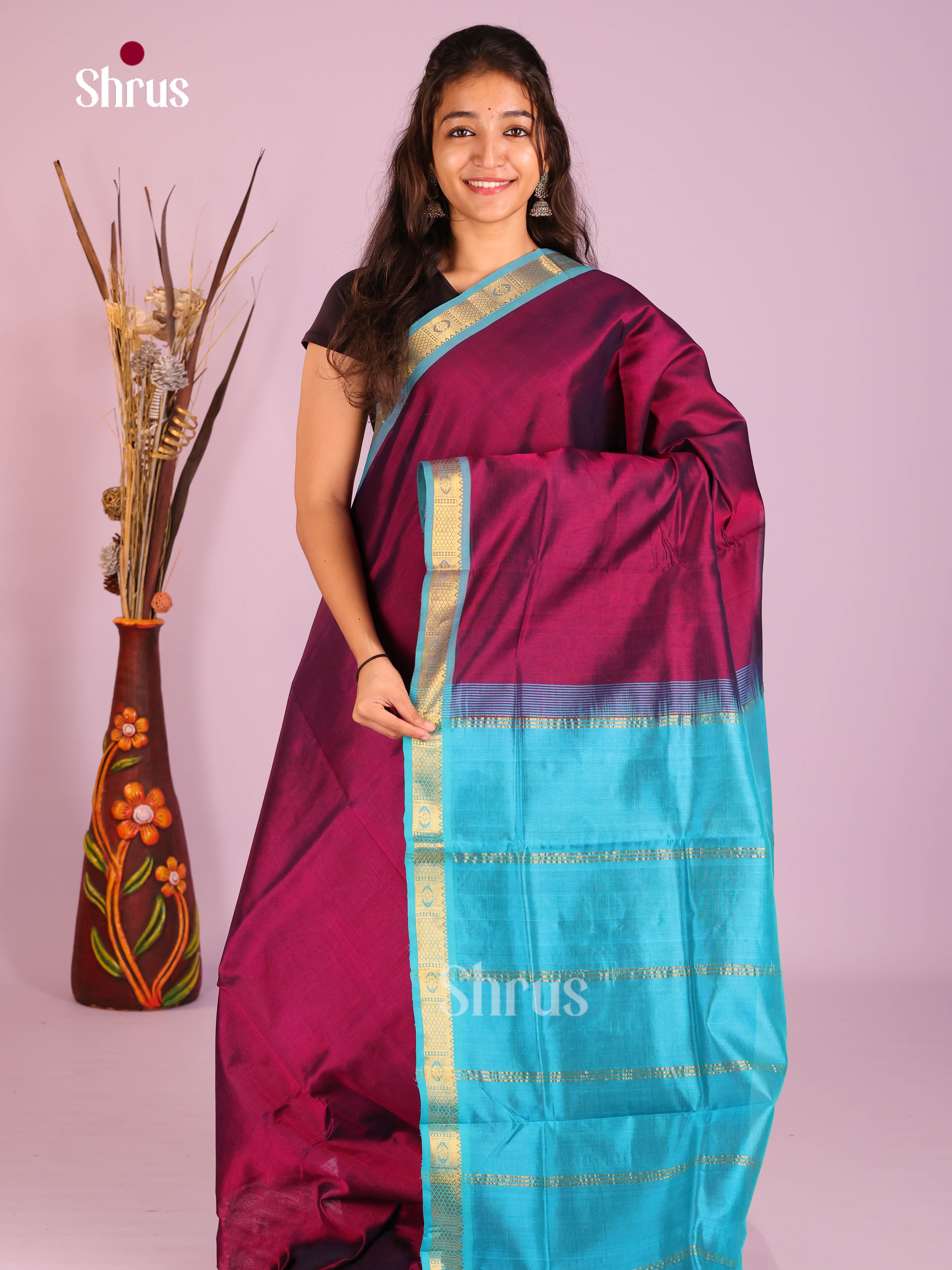 Traditional Maroon Silk Cotton Saree With Plain Body & Blue Zari Border