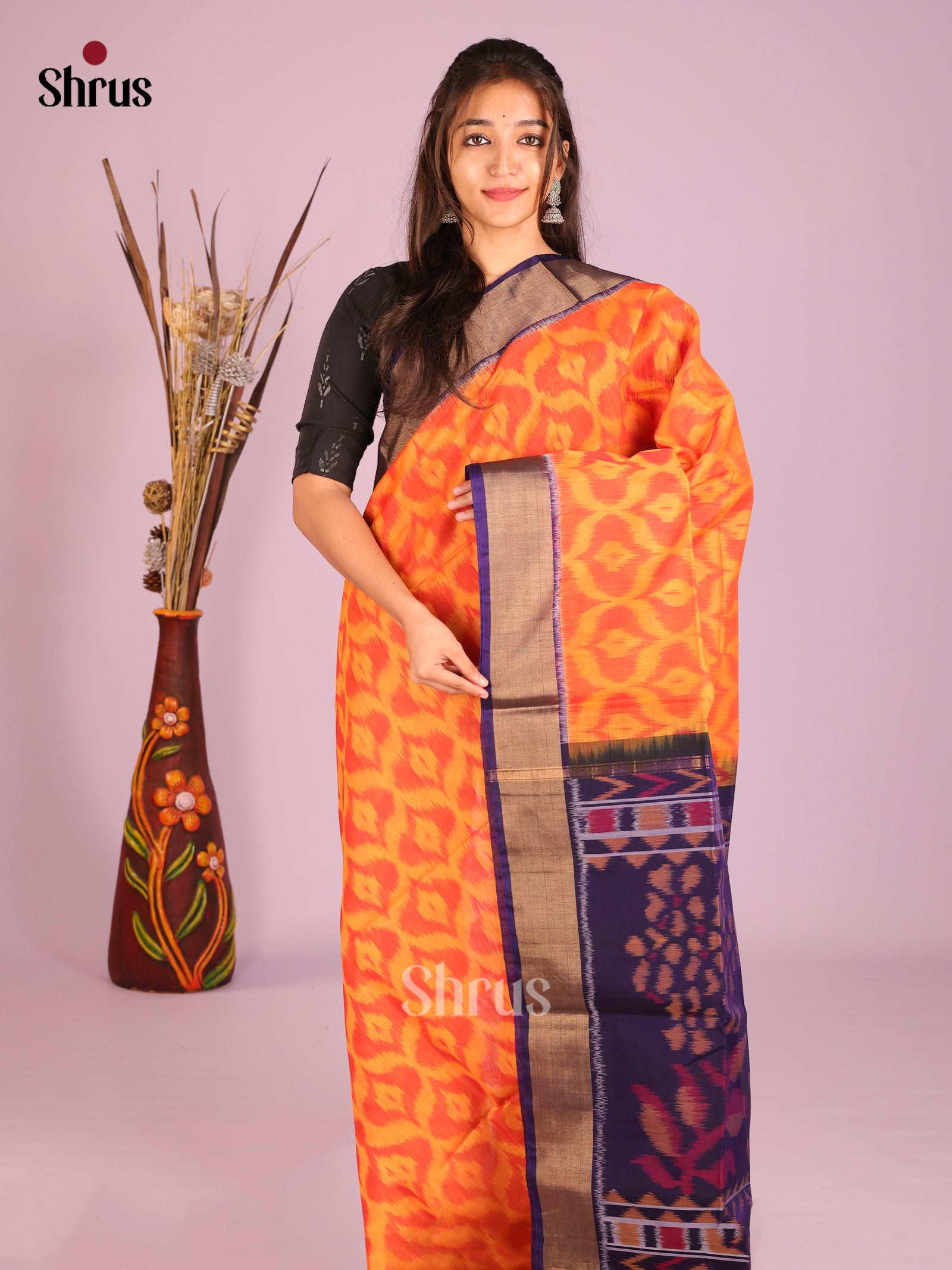 Elegant Orange Silk Cotton Saree With Pochampally Weaves & Deep Navy Zari Border