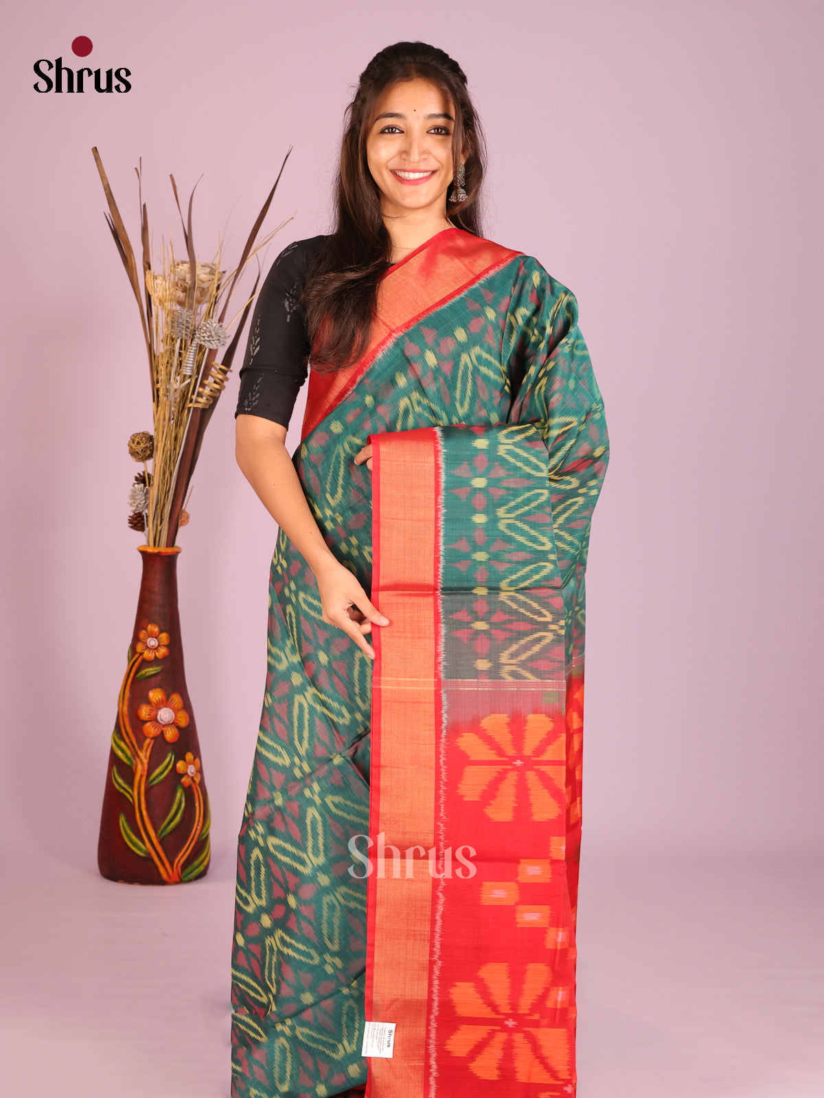 Striking Teal Silk Cotton Saree With Pochampally Pattern & Red Ikkat Pallu