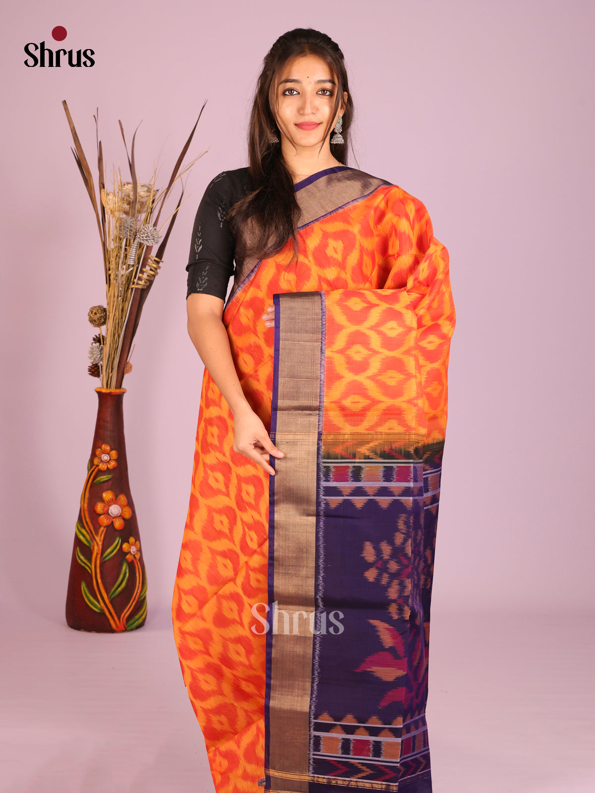 Sheeny Orange Silk Cotton Saree With Pochampally Weaves & Deep Navy Zari Border