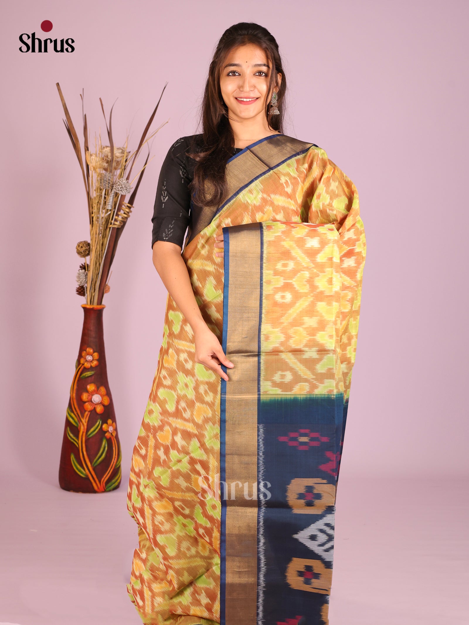 Pale Orange Pochampally Silk Cotton Saree with Floral Design & Peacock Blue Zari Border