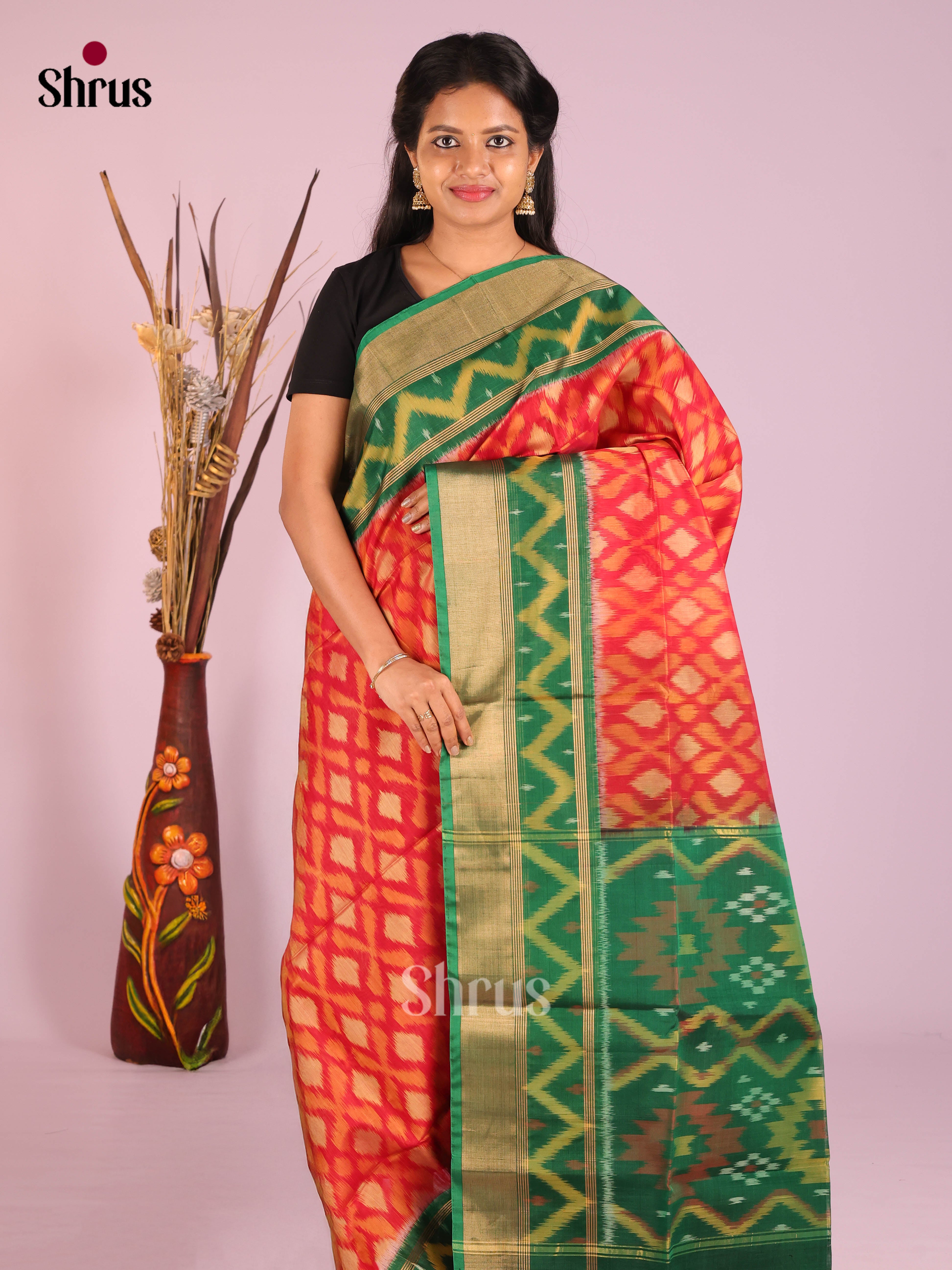 Vibrant Orange Silk Cotton Saree With Pochampally Pattern & Green Ikkat Border