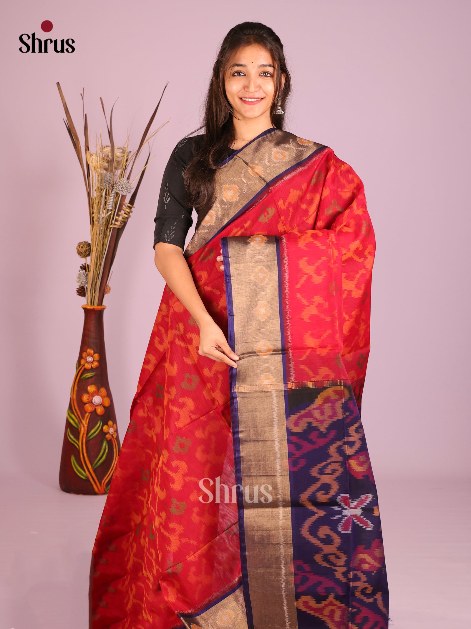 Classic Reddish Orange Pochampally Ikkat Saree With Navy Blue Pallu