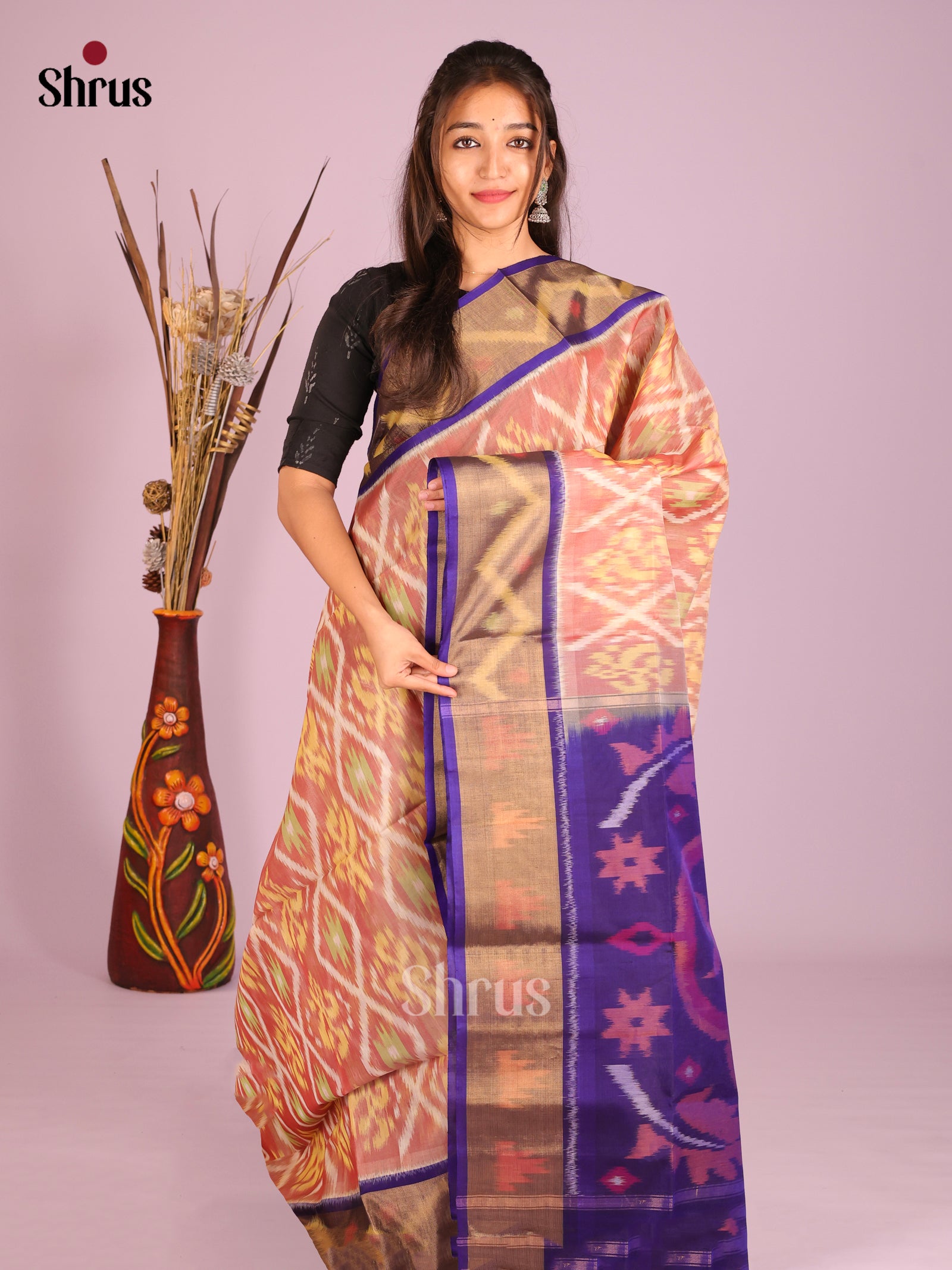 Ethereal Peach Pochampally Saree In Silk Cotton With Deep Purple Ikkat Pallu