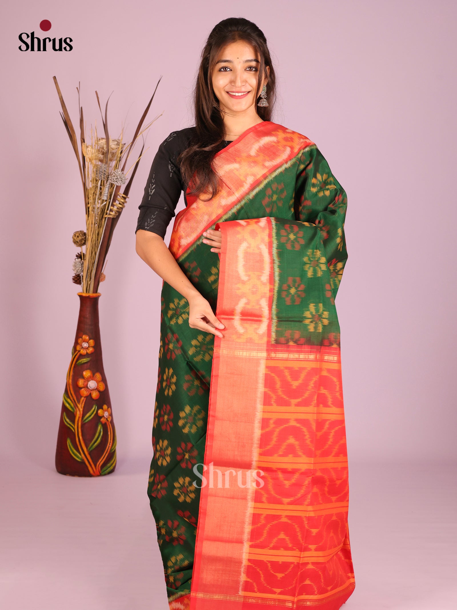 Stunning Green Pochampally Silk Cotton Saree & Orange Ikat Border