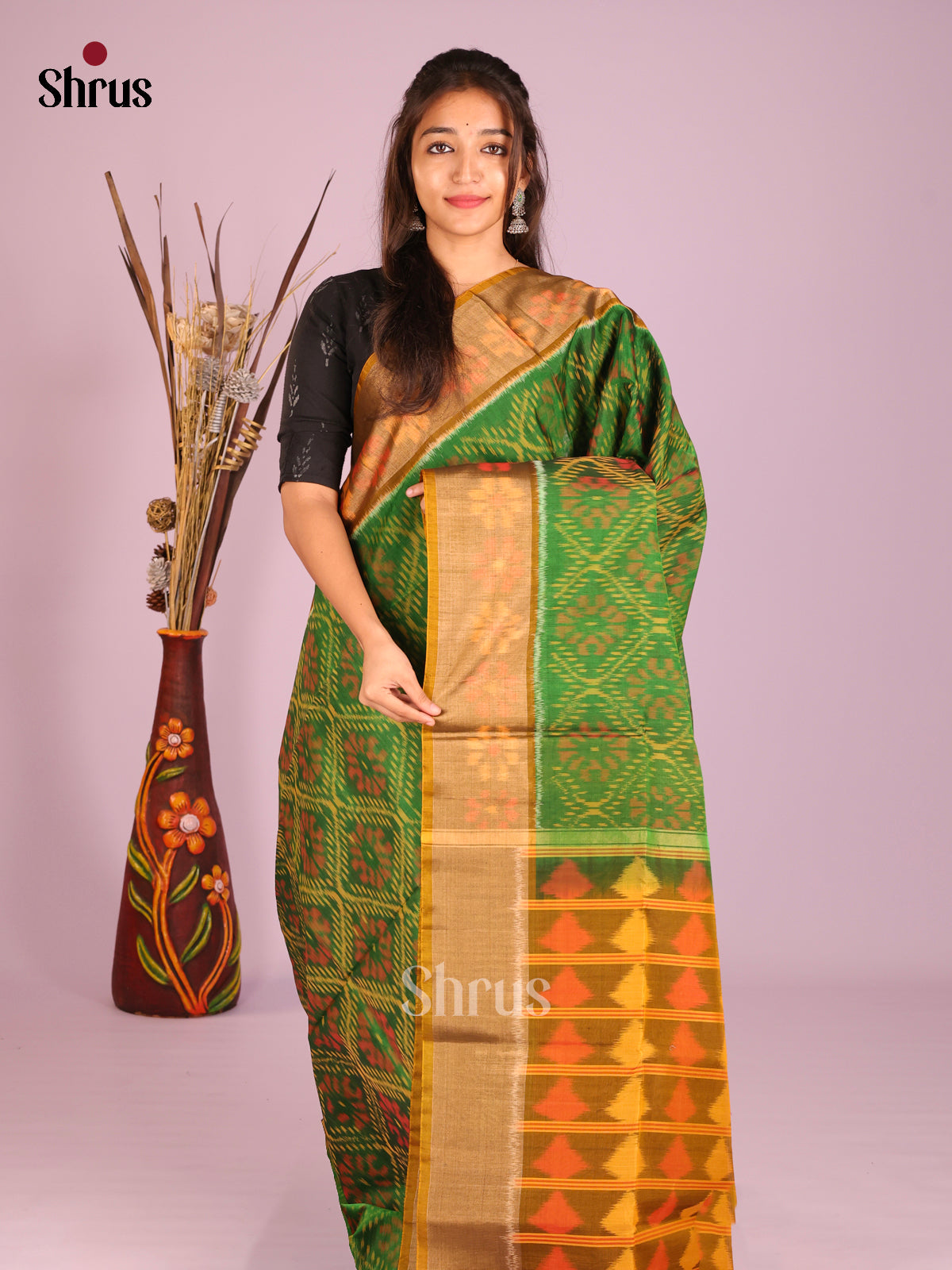 Luminous Green Silk Cotton Saree With Pochampally Pattern & Mustard Ikkat Border
