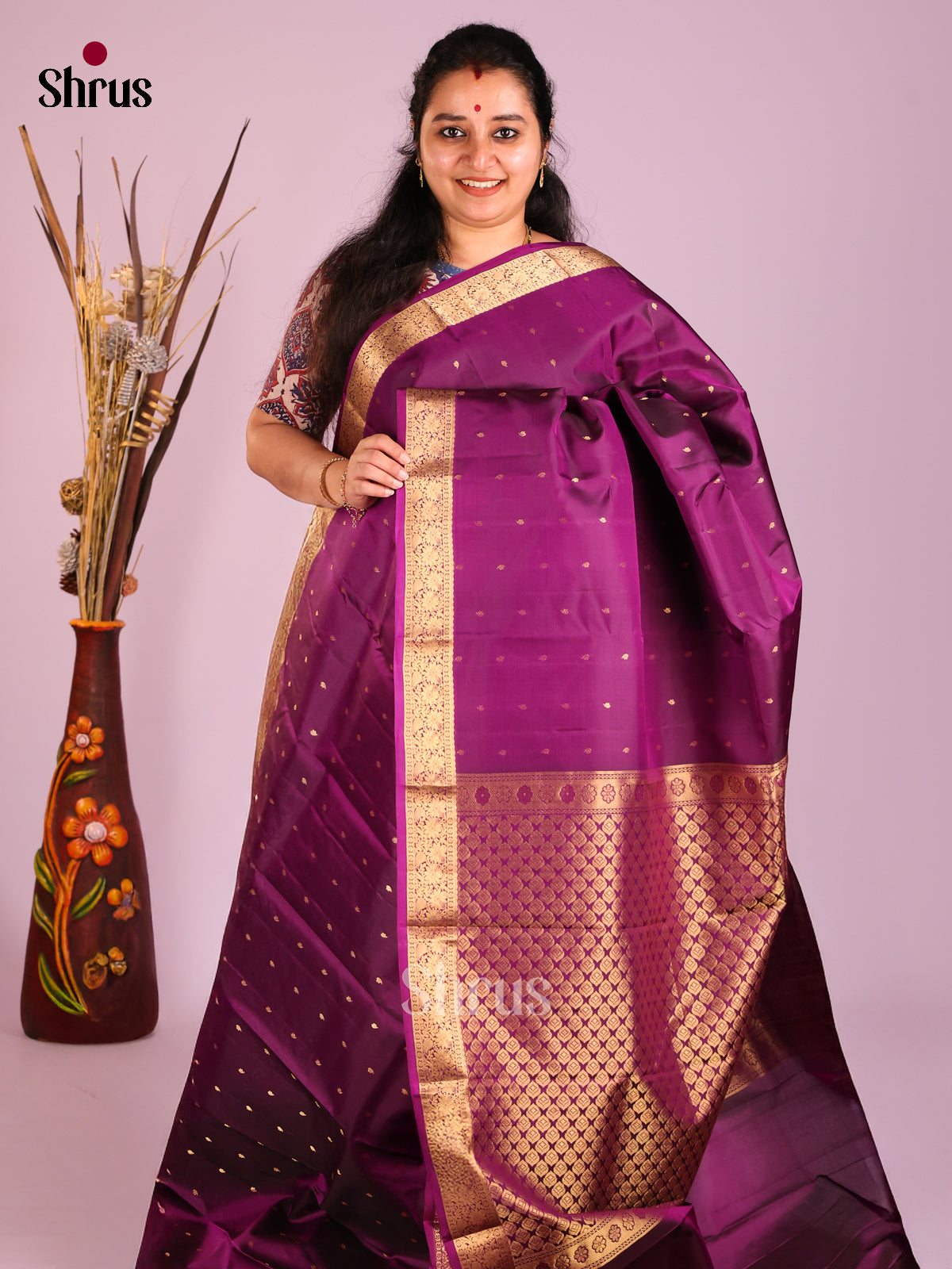 Purple single Tone Kanchipuram Butta design Saree with criss cross brocade pallu - Shop on Shrus.com