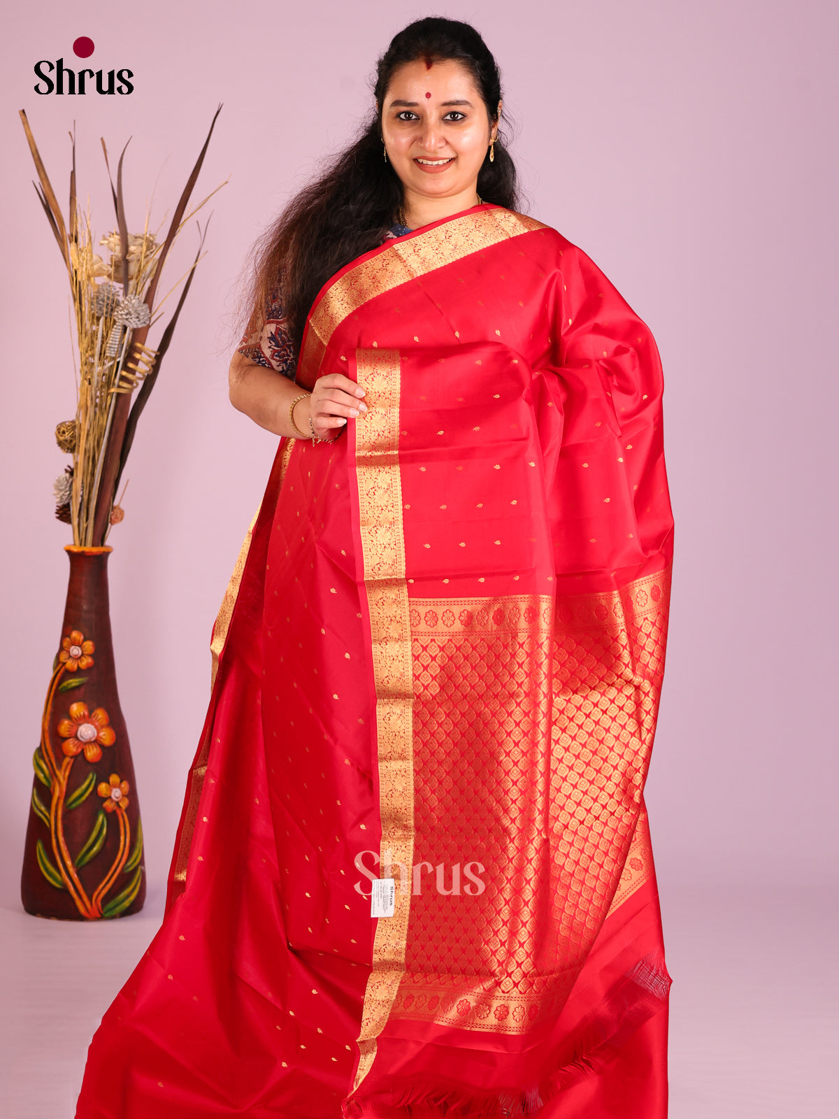 Red Single Tone Kanchipuram Butta design Saree with criss cross brocade pallu