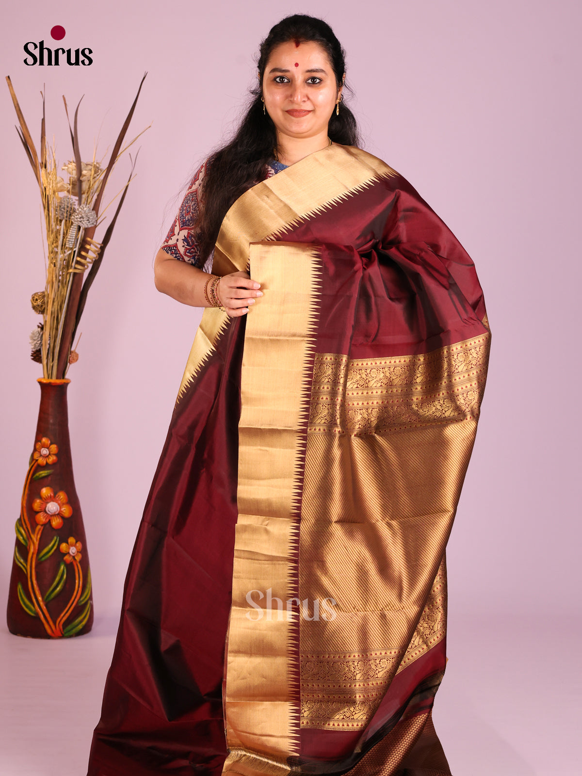 Maroon Single tone Kanchipuram silk Saree with kaddi zari border