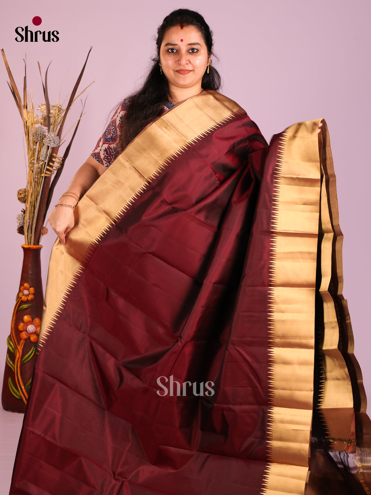 Maroon Single tone Kanchipuram silk Saree with kaddi zari border