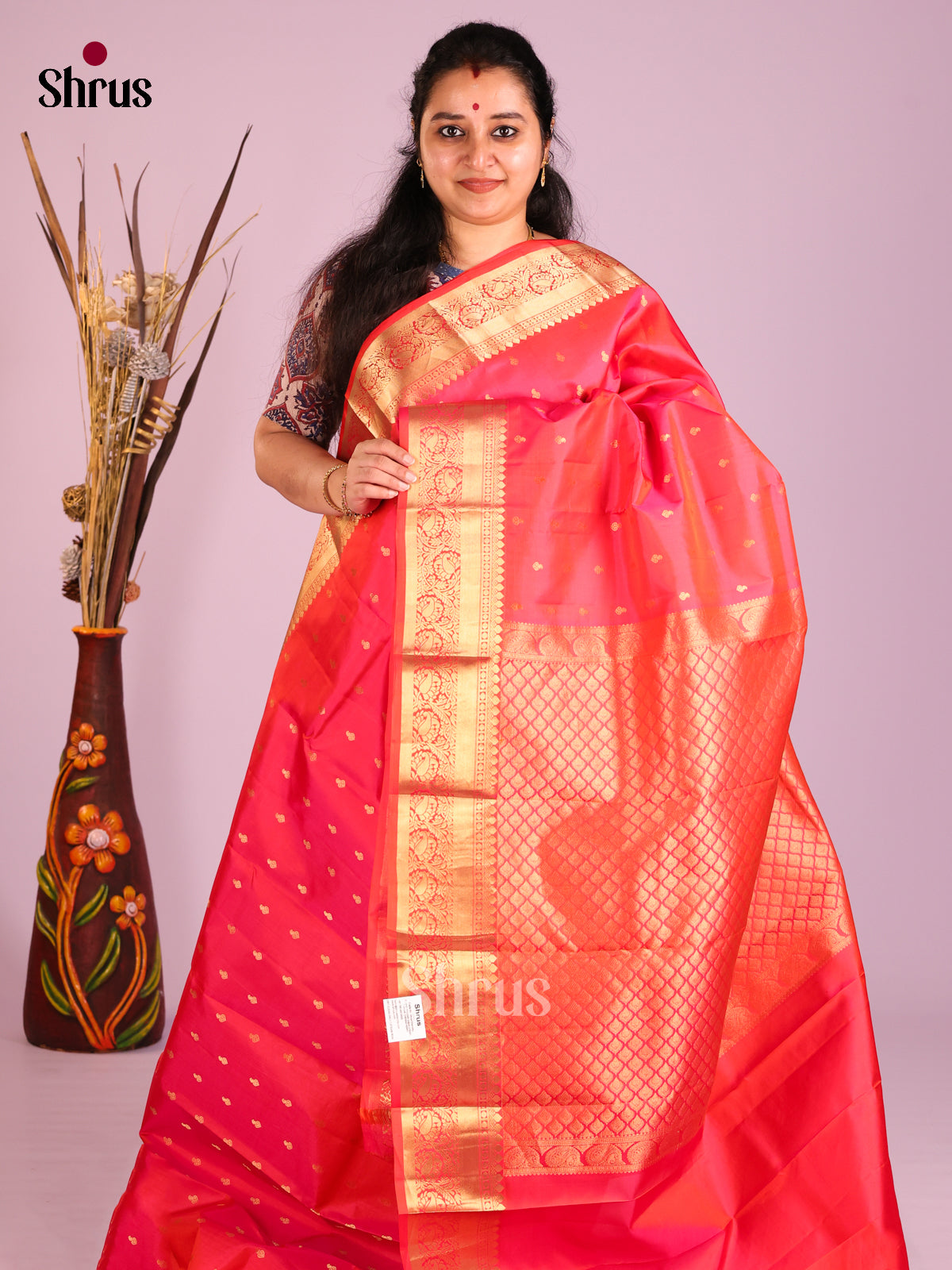 Pretty Orangish Pink Kanjivaram Saree with Small Buttas & zari border
