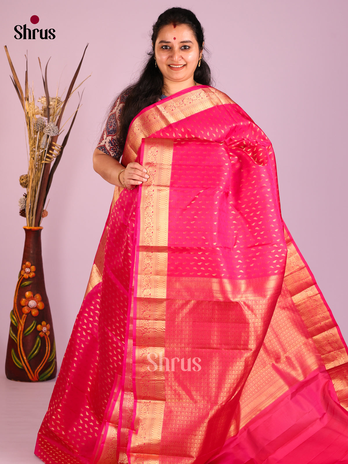 Timeless Pink Kanjivaram Saree with Golden Buttas & traditional zari border