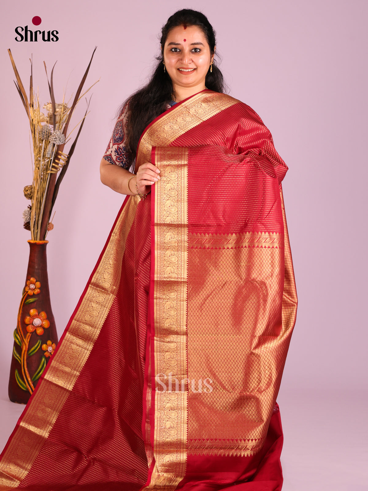 Red single Tone Kanchipuram Butta design Saree with zari brocade pallu