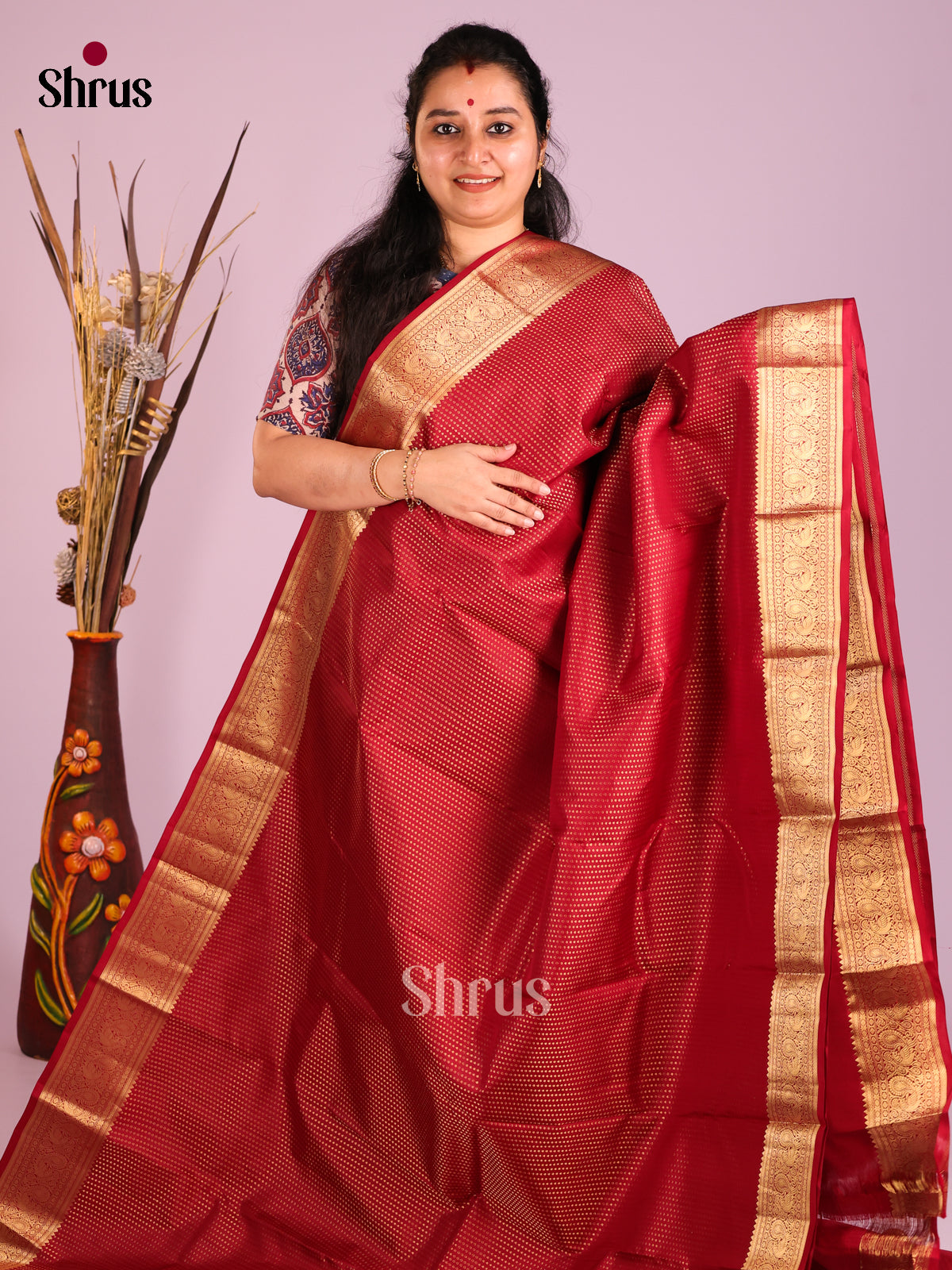Red single Tone Kanchipuram Butta design Saree with zari brocade pallu