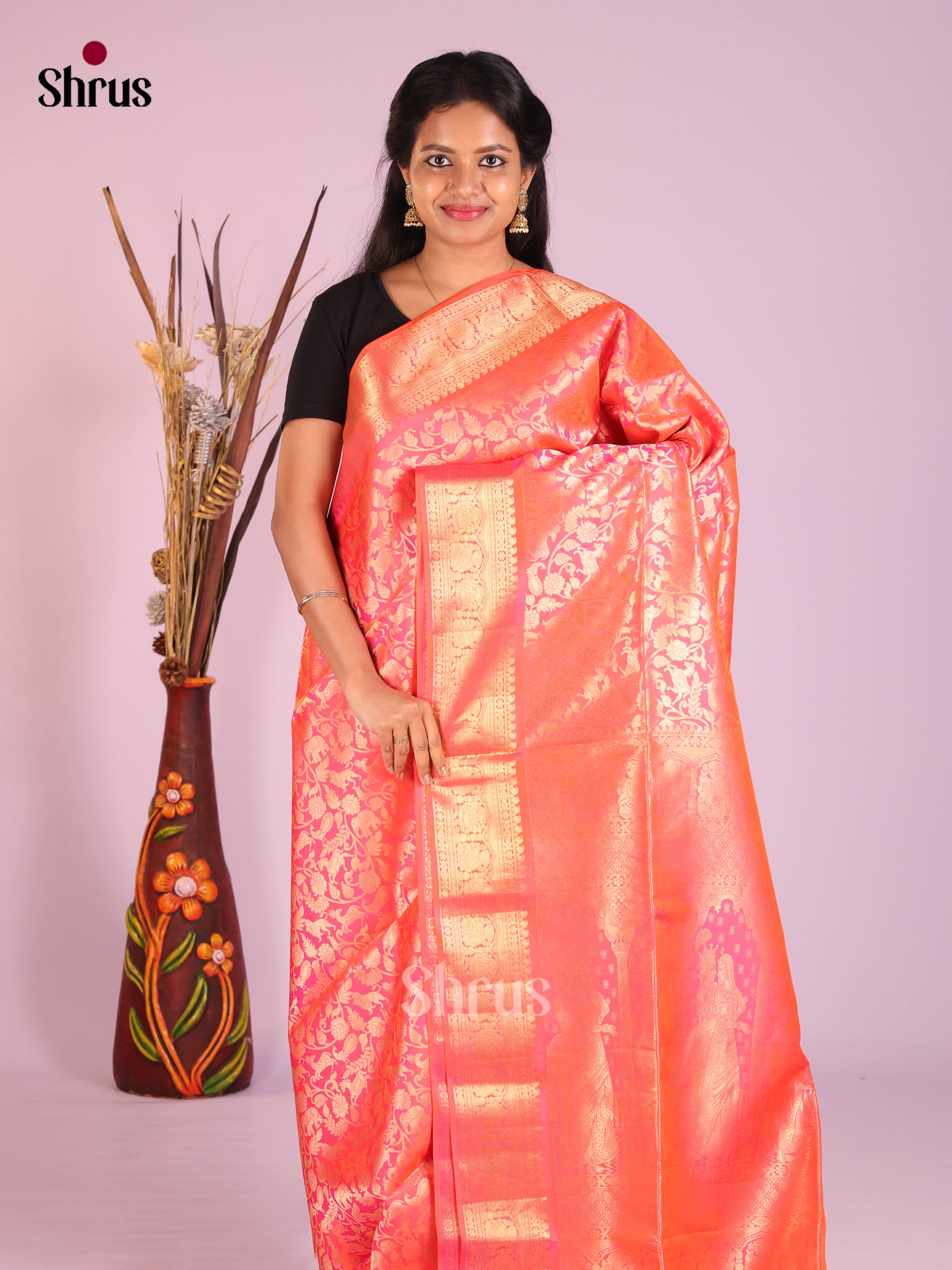 Shimmering Peach Soft Silk Saree With Zari Floral Nestling Brocade